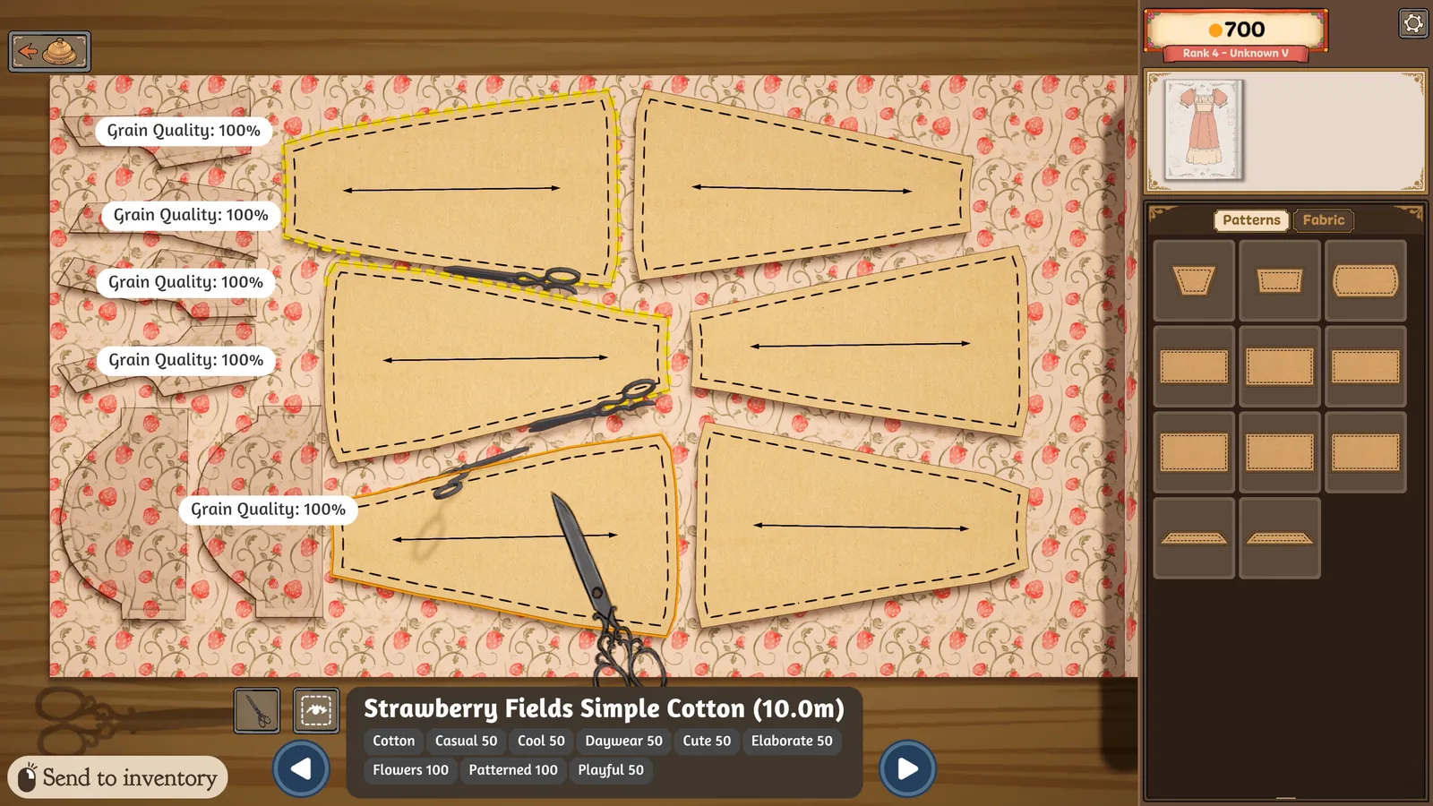 Dressmaker cutting table with pattern pieces arranged on fabric and the Grain Quality indicator at 100 percent